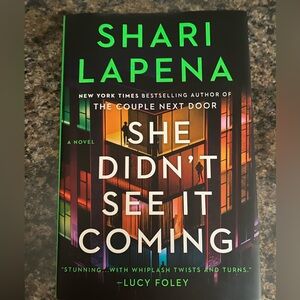 She Didn't See It Coming by Shari Lapena, hard cover!
